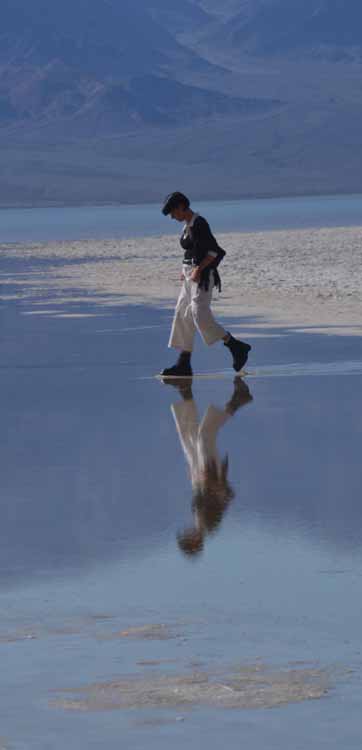 person reflected in water
